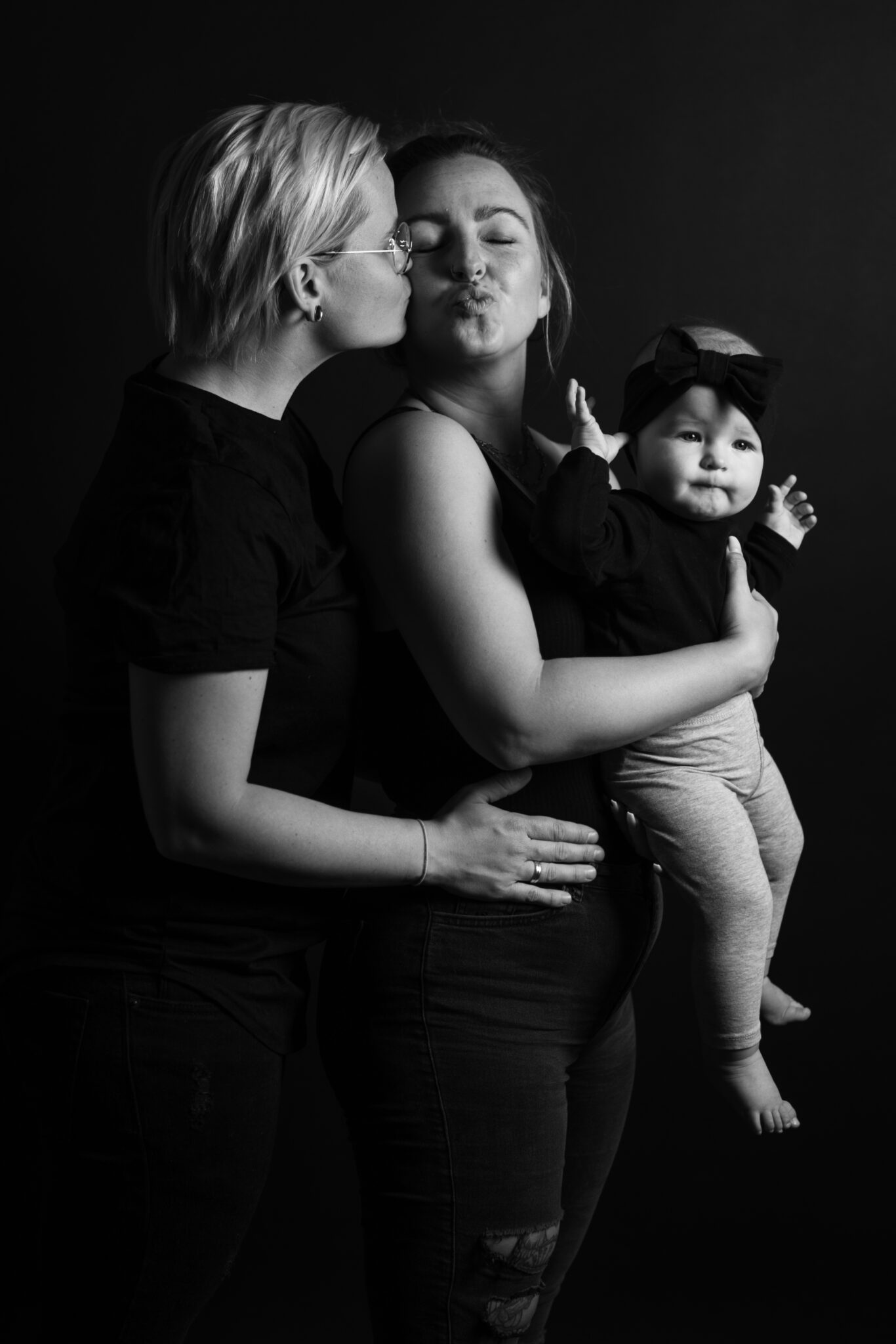 Familienfotos im Fotostudio mit Kind